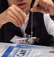 Workshop participant with a model