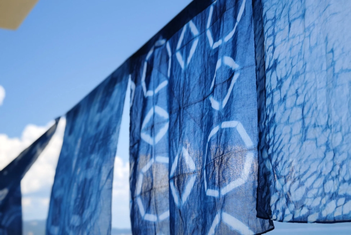Indigo dyed fabric waving in the wind