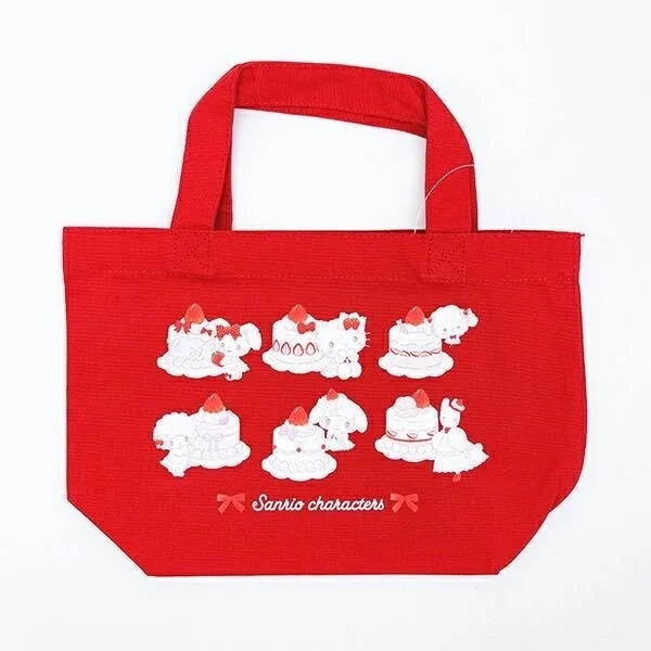 Sanrio characters on a red tote bag with cake and strawberries