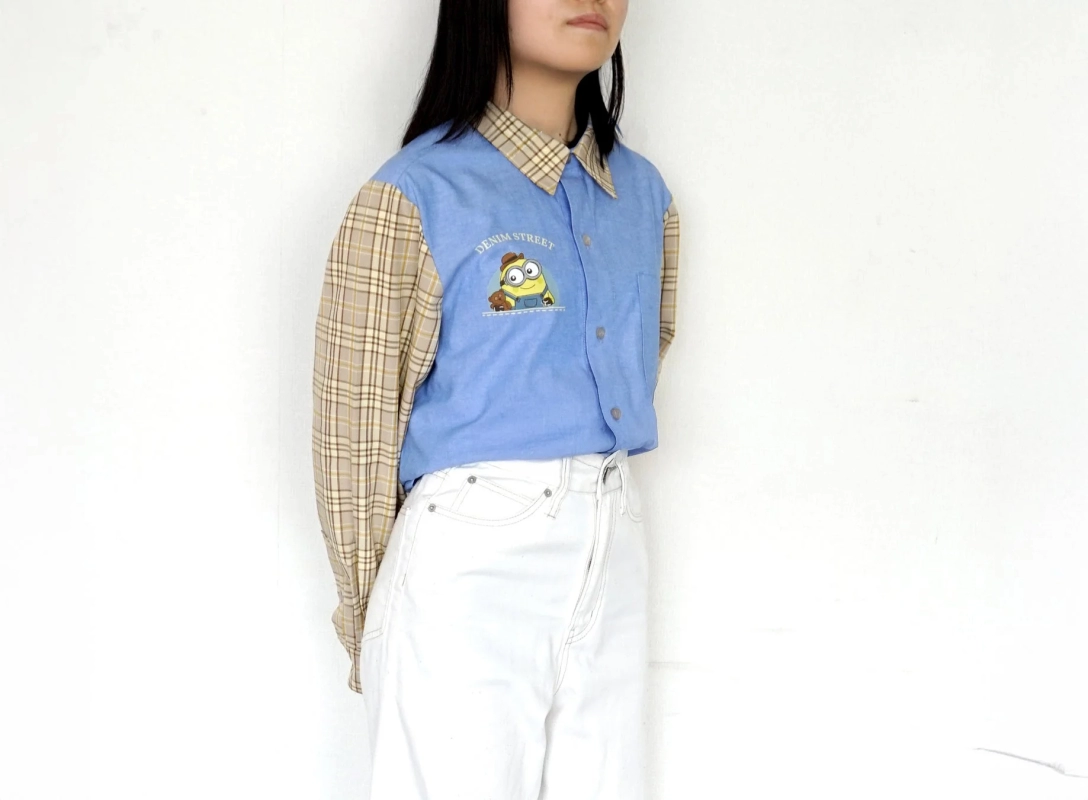 Woman wearing Minion check sleeve shirt
