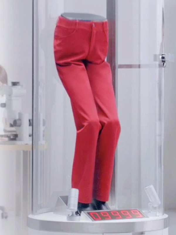 Red pants in a display case, possibly with testing equipment
