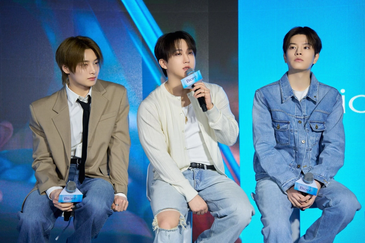 Stray Kids members speaking at Biore event