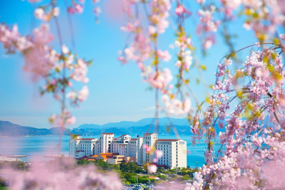 AoAwo Naruto Resort exterior with cherry blossoms