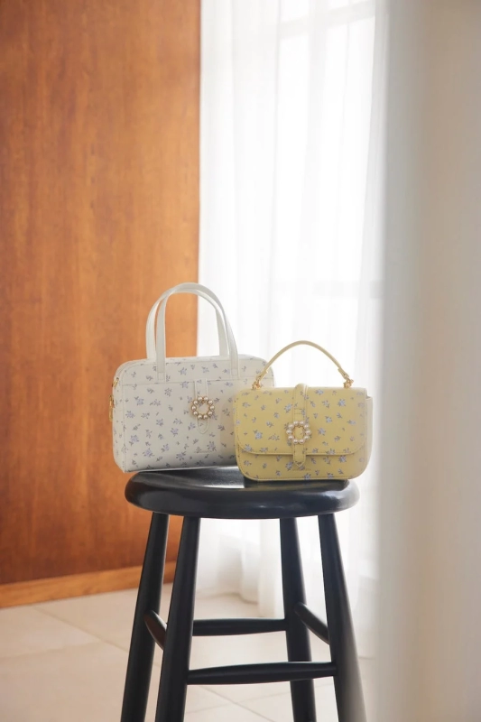 Close-up of floral Samantha Vega bags