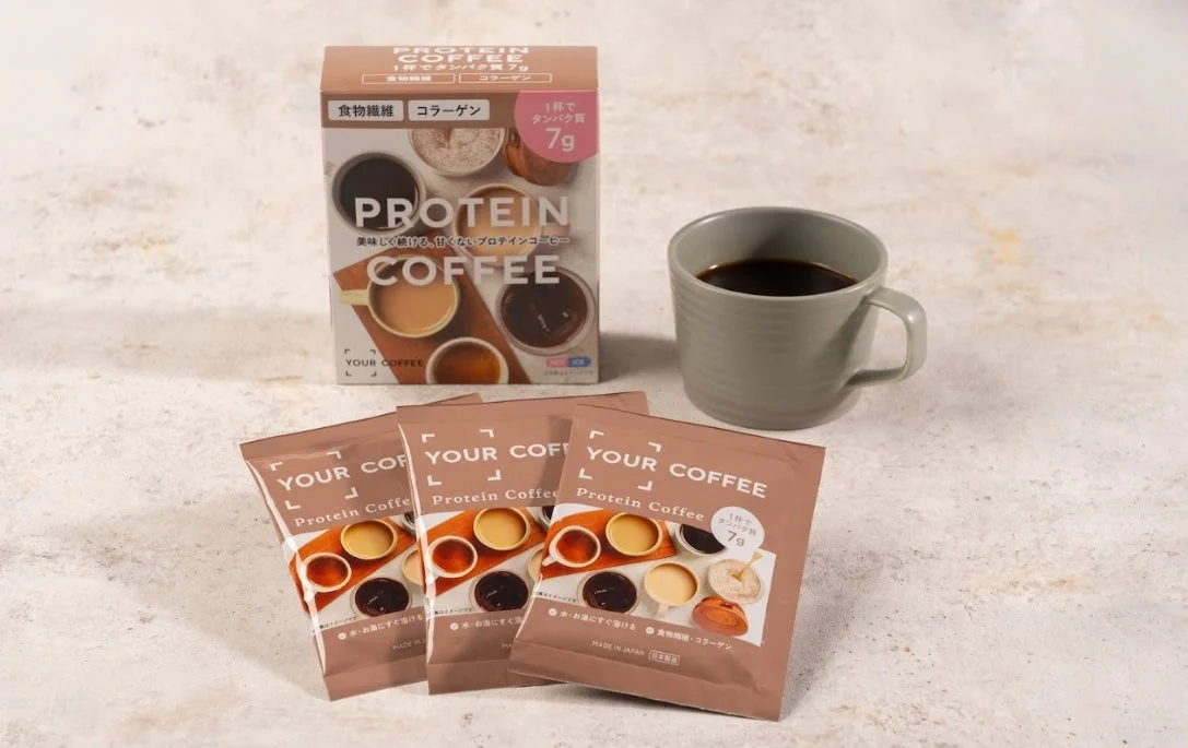 YOUR COFFEE product in a cup with packaging