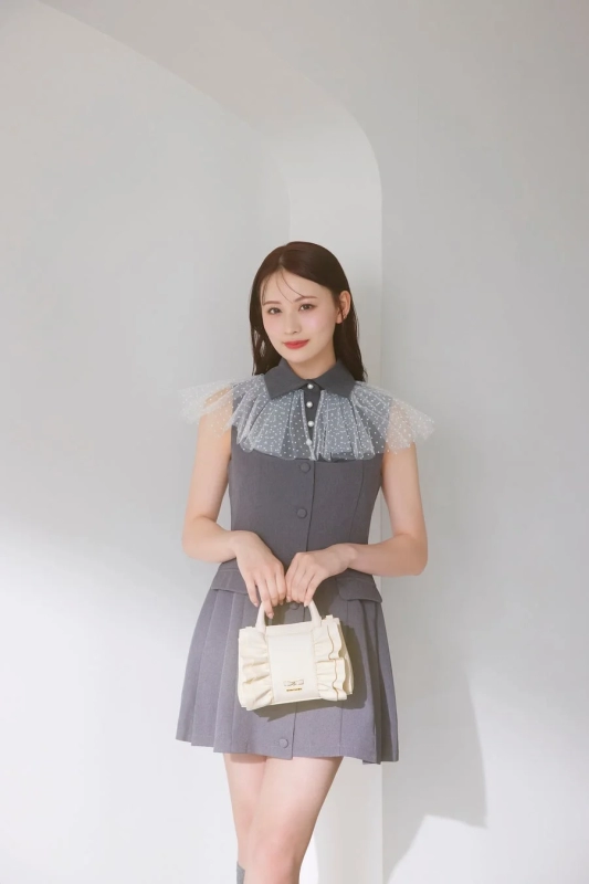 Kotomi Tachibana with a mini handbag from the French Girly series