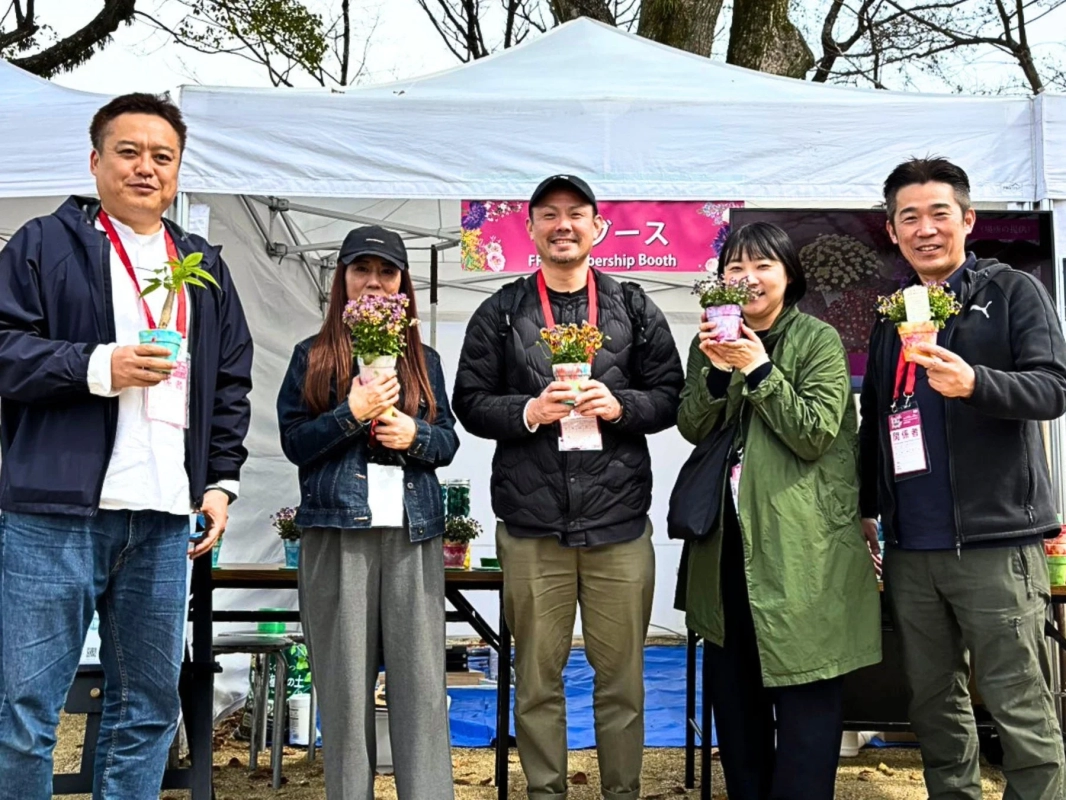 Group photo at the workshop booth