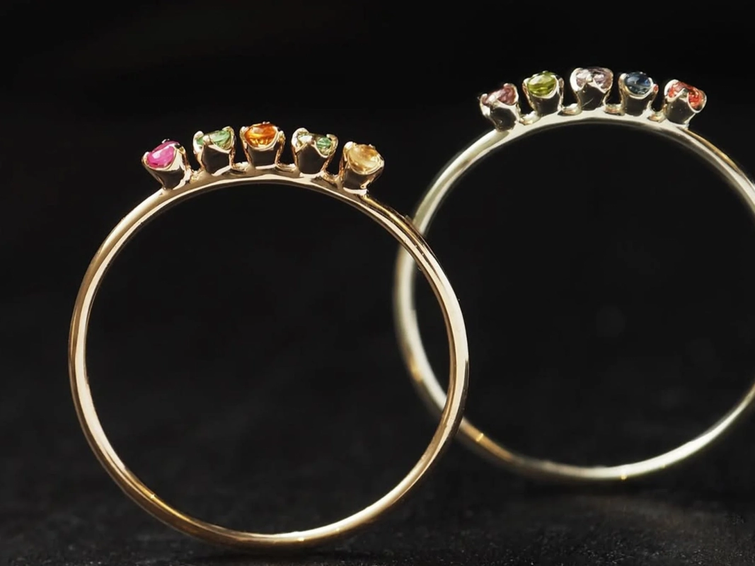 Two Luce rings with various stones