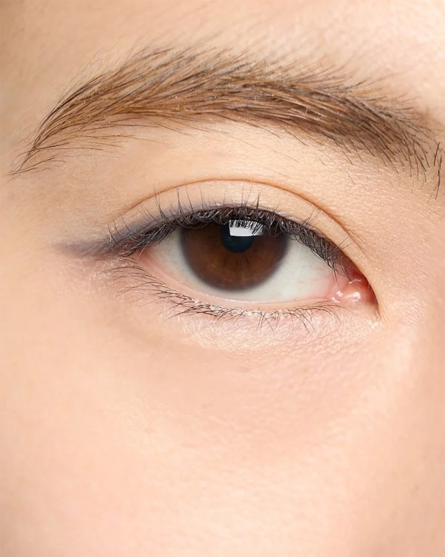 Eye with gray-blue eyeliner