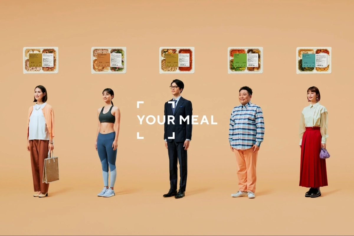 Diverse individuals with various meal kits from YOUR MEAL
